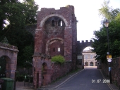 Exeter Castle gatehouse with County Court buildings in background